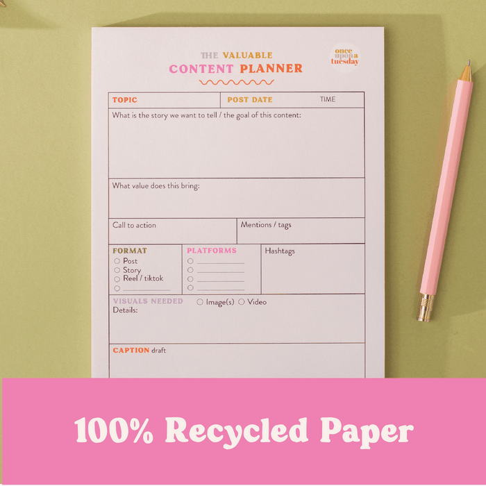Content planner page with pink pencil on sage green background, featuring a pink banner overlay stating "100% Recycled Paper". The planner shows sections for topic, post date, call to action, format options, and caption draft, with pink and orange headers.